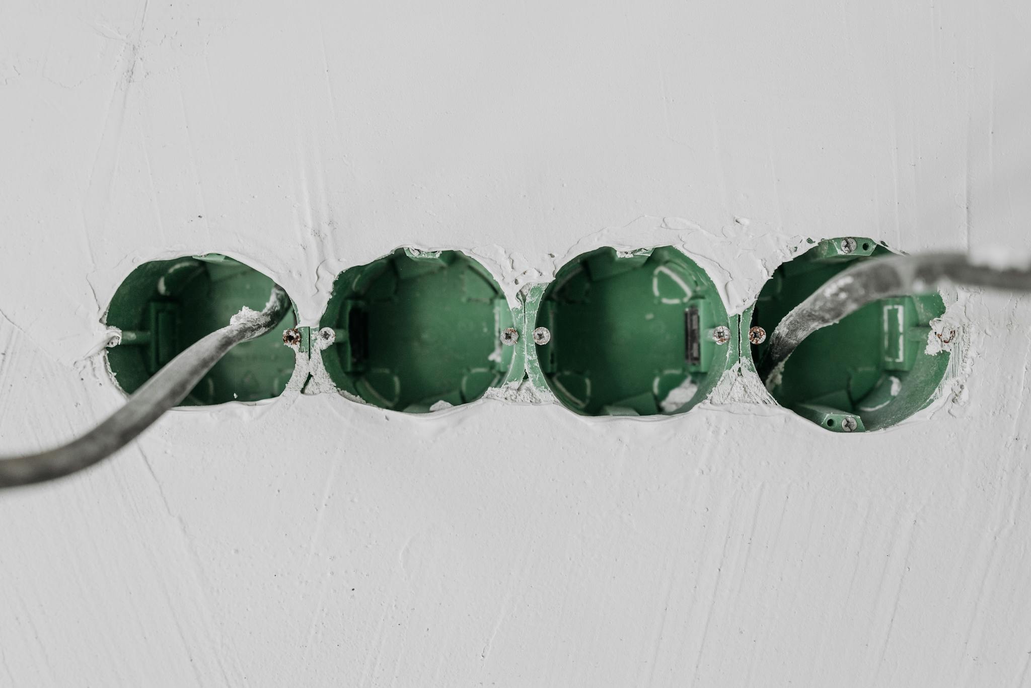 Close Up Of Green Electrical Boxes And Wiring